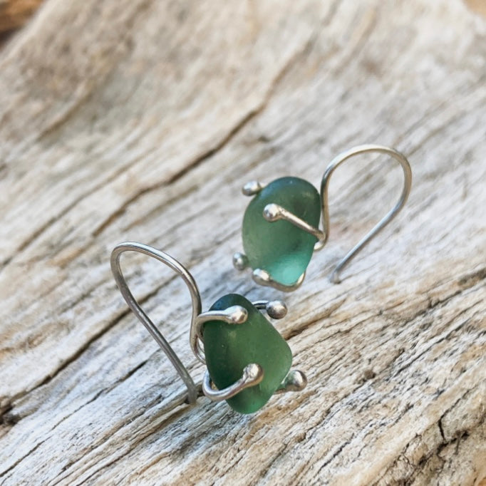 a. EARRINGS . dangles . green blue